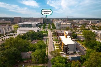 An aerial view of a city with a building labeled cleveland clinic.